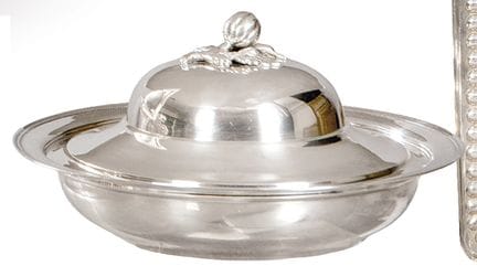 Circular container with a hallmarked 900 silver li
