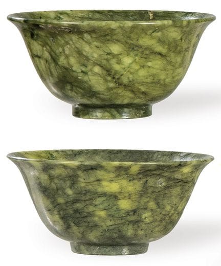 Two carved spinach jade bowls, China, Qing Dynasty