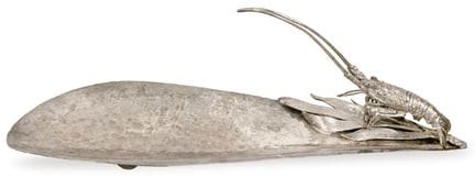 Silver-plated metal centerpiece in the shape of a 