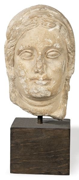 "Veiled Female Head" carved in limestone, Greece, 