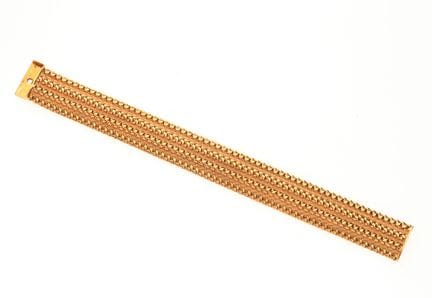 RIBBON BRACELET
Yellow gold, braided links
A suppl