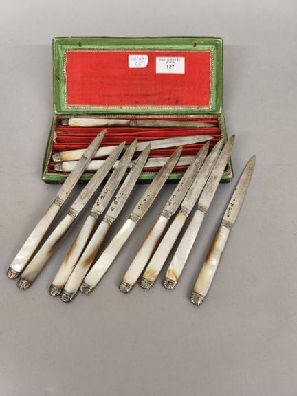 12 couteaux de table, les lame en argent 925°/°°, 