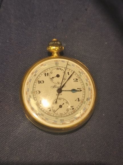 Reloj cronógrafo de oro de 750°/°, esfera esmaltad
