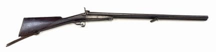法国
插销式猎枪
19世纪中叶
木制枪托，短枪管，后部底板上有难以辨认的圣艾蒂安签名，枪管呈水平排列