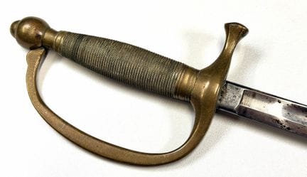美国
1840型音乐家佩剑
19世纪末
单臂黄铜护手，黄铜镂空剑杆，直刃单刃单反刃，剑身上刻有“Am