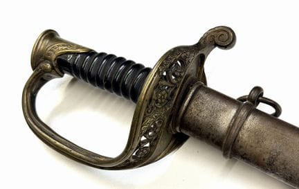 法国
1855型步兵军刀
第三共和国
黄铜刀柄，一侧带凹槽；木制刀柄无水印；刀身笔直，背部平坦，刻有