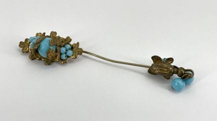 MIRIAM HASKELL.
Tie pin in gilt metal and turquois
