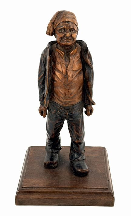 Statuetta raffigurante un uomo con il berretto (mu