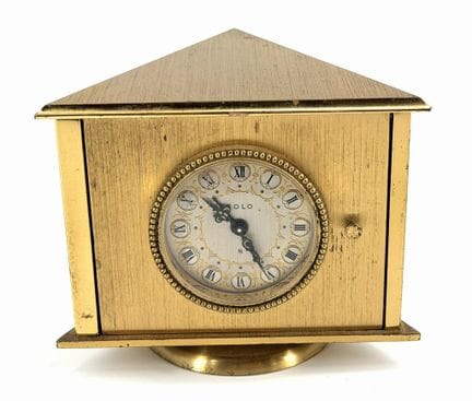 Orologio con barometro e termometro. Di forma tria