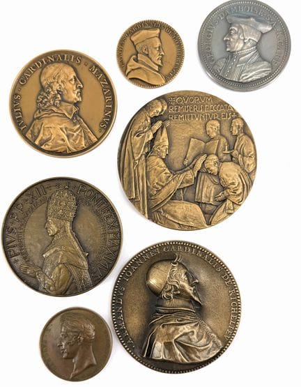 [MEDAGLIA]
Set di 7 medaglie in bronzo con soggett