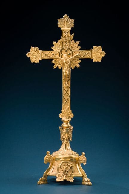 Gilded bronze crucifix with geometric and foliage 