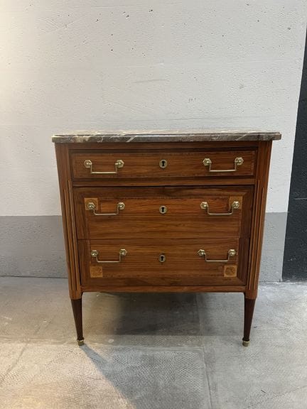 CHEST OF DRAWERS made of wood veneer with filet in