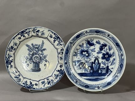 DELFT
TWO round earthenware plates, glazed and dec
