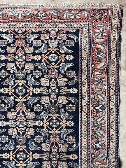 Tapis persan à décor herati sur fond bleu nuit, bo
