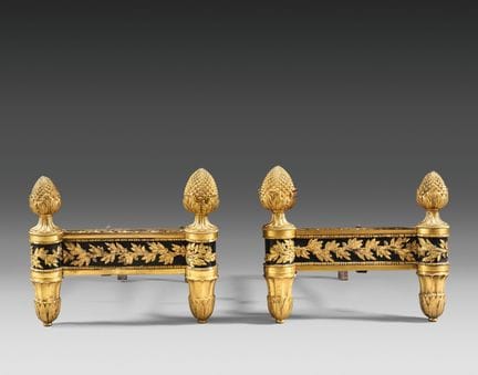 Coppia di alari in bronzo patinato e bronzo dorato
