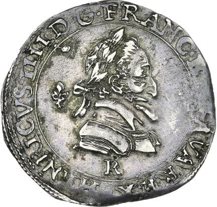 HENRI IV (1589-1610)
Demi franc au lis. 1602. Vill