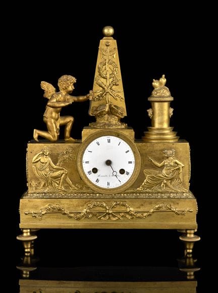 Dumoulin, opera belga.
Orologeria: Orologio da tav
