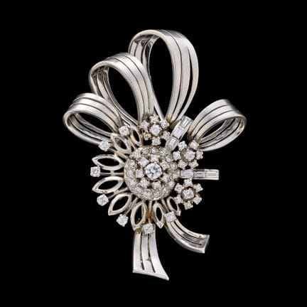 Jewelry.
Piece: Platinum and white gold brooch set