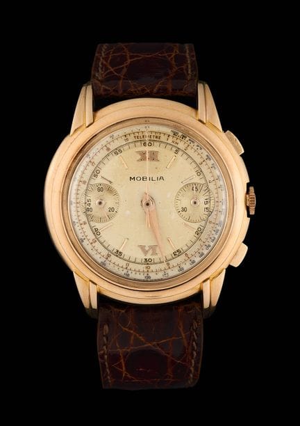 Mobilia.
Orologeria: orologio da polso in oro rosa