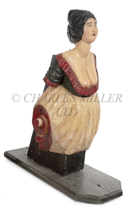 A 19TH CENTURY-STYLE MERCHANTMAN'S FIGUREHEAD

car