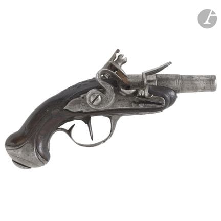 Pistola a pietra focaia da viaggio.
Canna rotonda,
