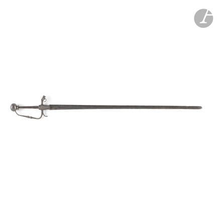 Petite épée de chevet.
En fer forgé, pommeau ovoïd