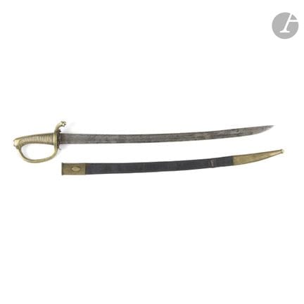 Sabre briquet modèle An IX.
Poignée en bronze, poi