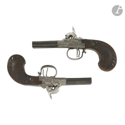 Coppia di pistole a doppia canna a percussione.
Ca