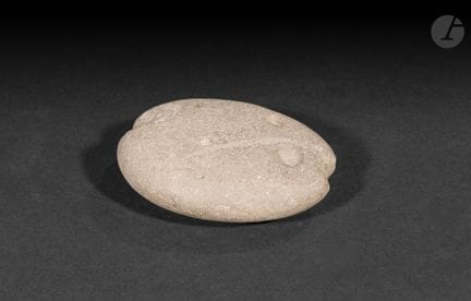 Carved stone, probably an axe head, North America
