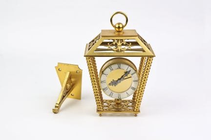 Hour Lavigne, Wanduhr „Lanterne“ aus vergoldetem M