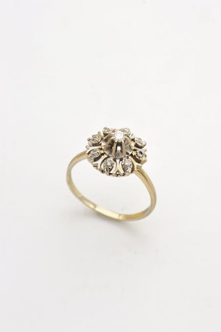 Blumenring aus Gelbgold (750) mit einem runden Dia