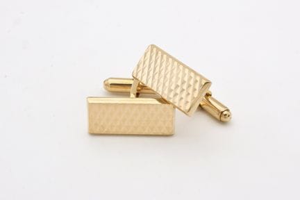 Par de botones de manga rectangulares de oro amari