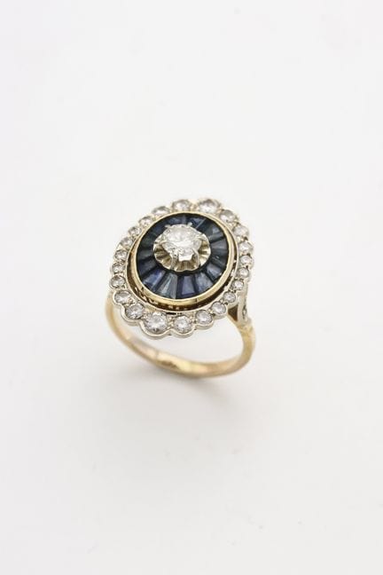 Durchbrochener Ring aus Gelb- und Weißgold (750) m