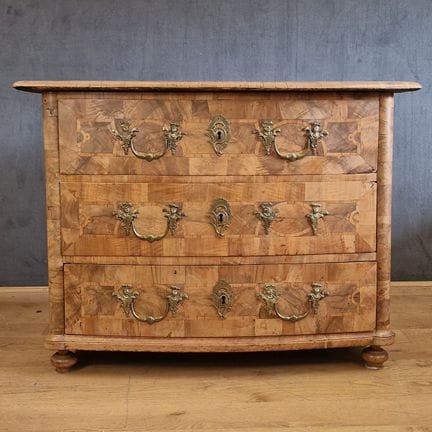 CHEST OF DRAWERS with curved front—Probably from e