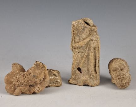 LOT CONSISTING OF A HEADLESS DRAPED STATUETTE, A S