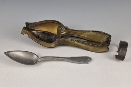 19th-century bronze spoon mold signed Bazin Ainé (