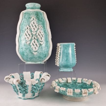 SAINTE-RADEGONDE 
Ensemble de DEUX VASES ET DEUX C