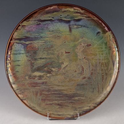 Pierre PERRET (1850-1926)
PLAT CIRCULAIRE à décor 