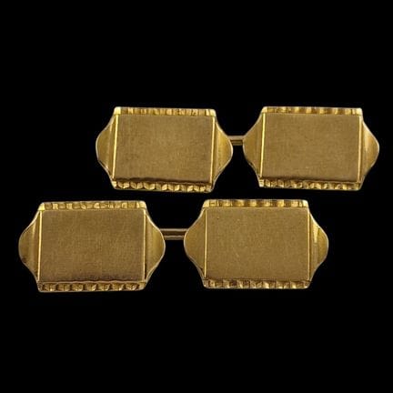 一对20世纪中叶的袖扣，750千分之一黄K金，双圆点设计
重8.8克
（有轻微使用痕迹）