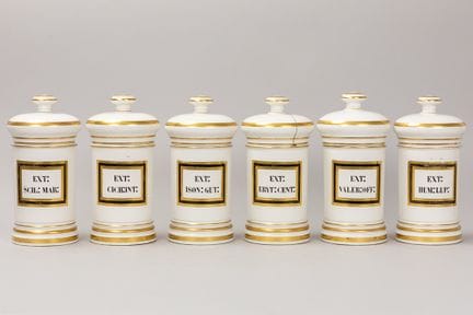 series of six pharmaceutical jars in partly gilded