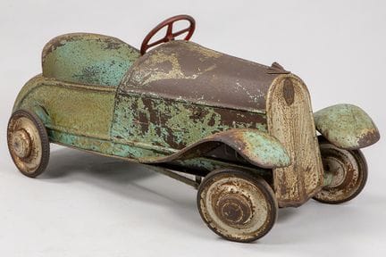 vintage completely original model car in red paint