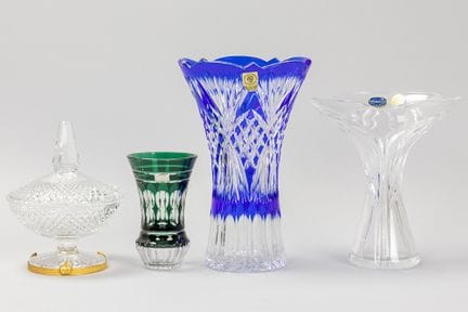 four pcs of crystal, three vases and a sweet box

