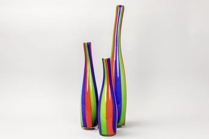 three bottle-shaped vases in mouth blown glass wit