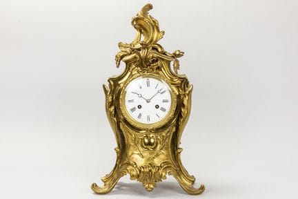 antique Louis XV style clock in bronze with work s