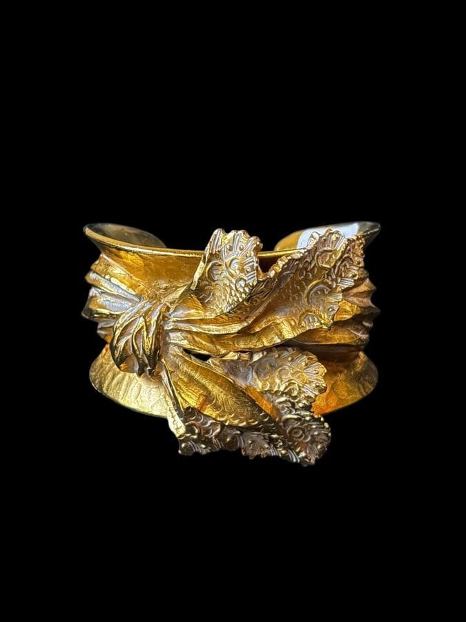 CHRISTIAN LACROIX Gold-plated bronze leaf-motif cuff bracelet—signed, with pouch 
6x6 cm