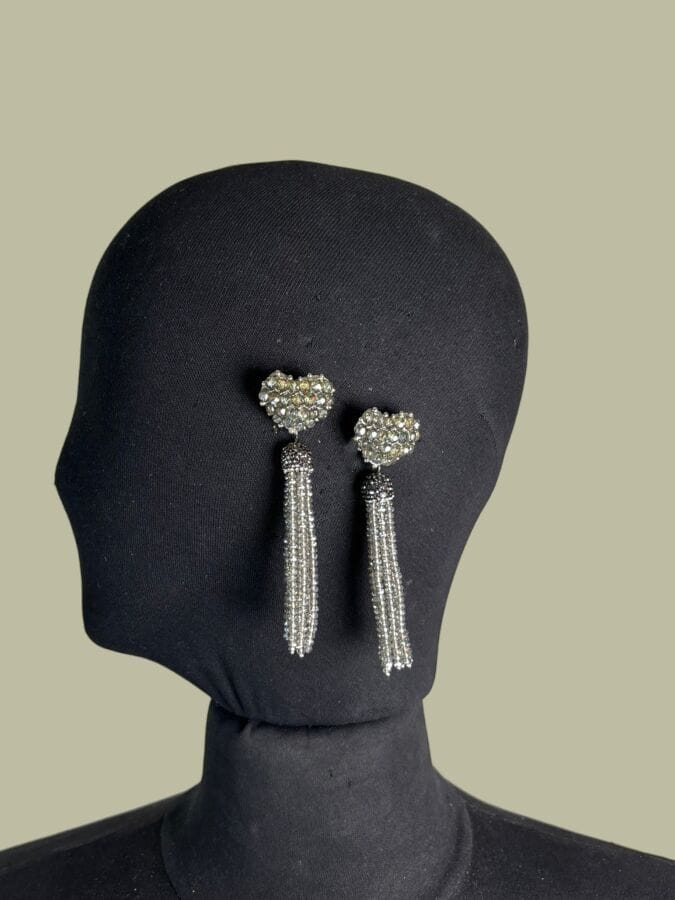 CHRISTIAN LACROIX Made in France  Paire de clips d'oreilles coeur en métal patiné argent à pampilles de perles de verre grises H : 9 cm