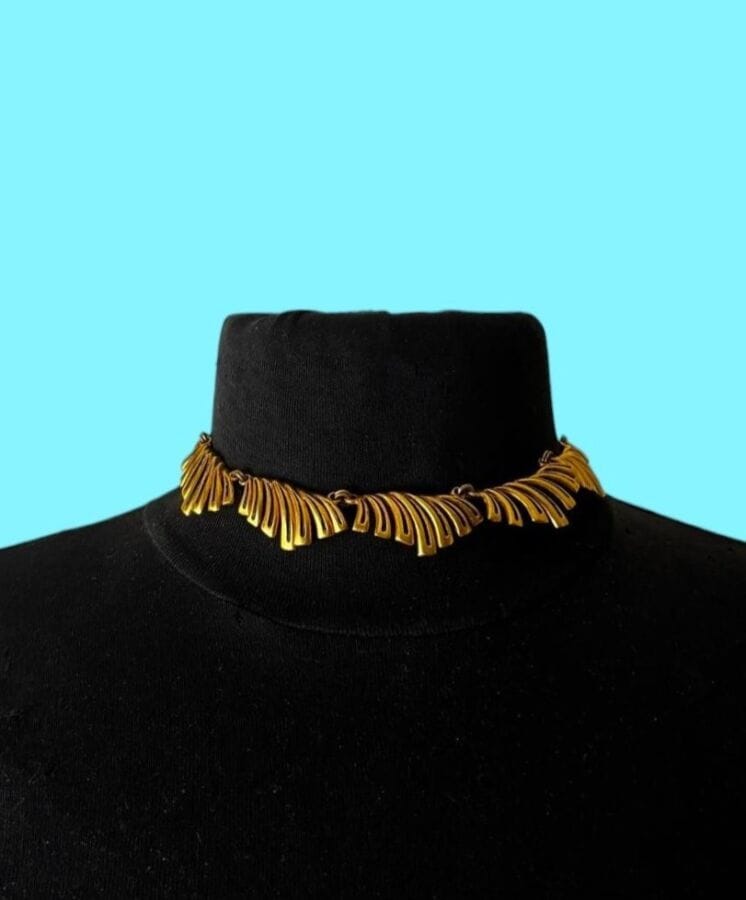 PAUL WIEGANT Openwork gold-plated metal necklace with palmette motifs - unsigned                                                                                 Length: 35 cm