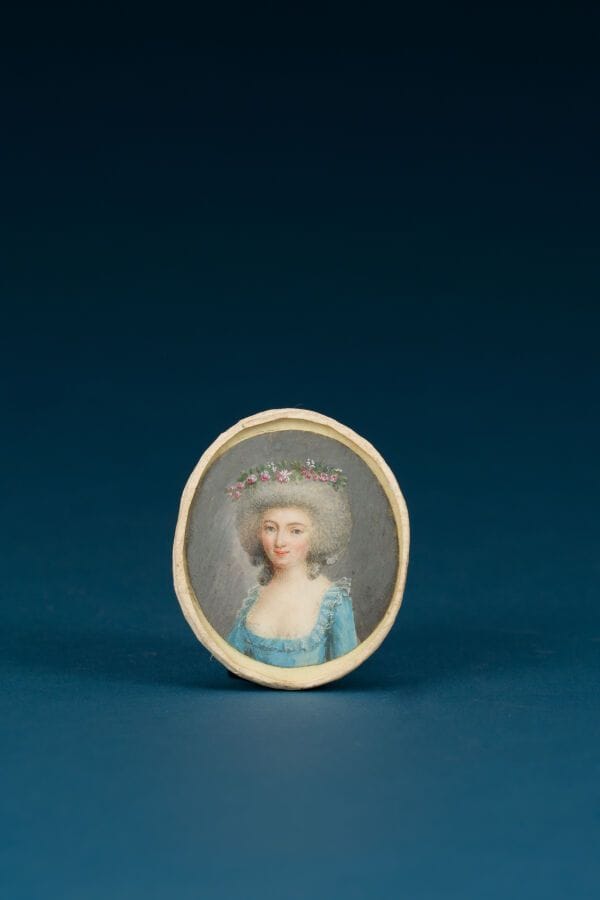 French School, late 18th century 
"Woman in a Blue Dress" 
Oval miniature
5 x 4.5 cm.