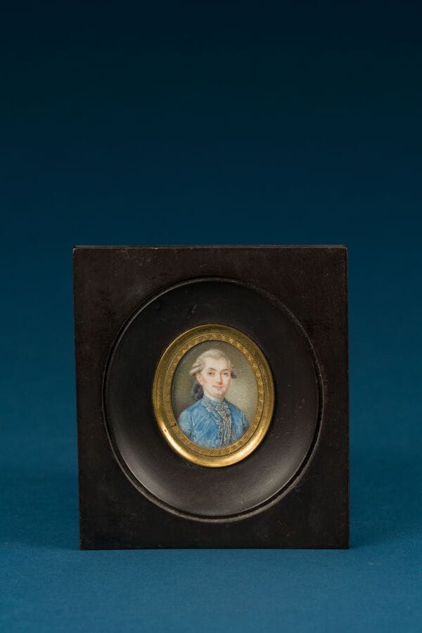 French School, late 18th century
"Portrait of a Man in a Blue Frock Coat"
Oval miniature 
Inscription on the back: "Gabriel de la Barrère, guillotined in 1793, father of Madame de Vergers"
4 x 3 cm.