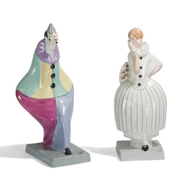 DAX - FAÏENCERIE DU MOULIN DES LOUPS À ORCHIES - 2 ŒUVRES 
Colombine 
Sujet décoratif. Épreuve en céramique émaillée polychrome. Signé DAX sur la terrasse et porte le cachet circulaire de la manufacture au revers. H. 33 cm 
Clown 
Sujet décoratif. Épreuve en céramique émaillée polychrome. Fêlures sur les deux faces. H. 35 cm